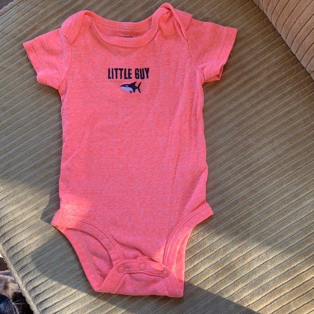 Carter’s “little guy” onesie